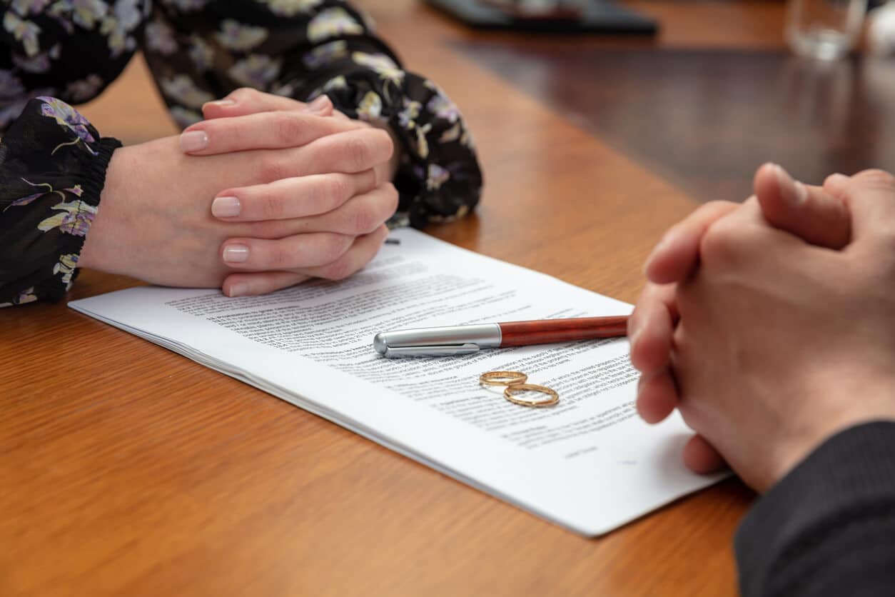Divorce signature, marriage dissolution document.